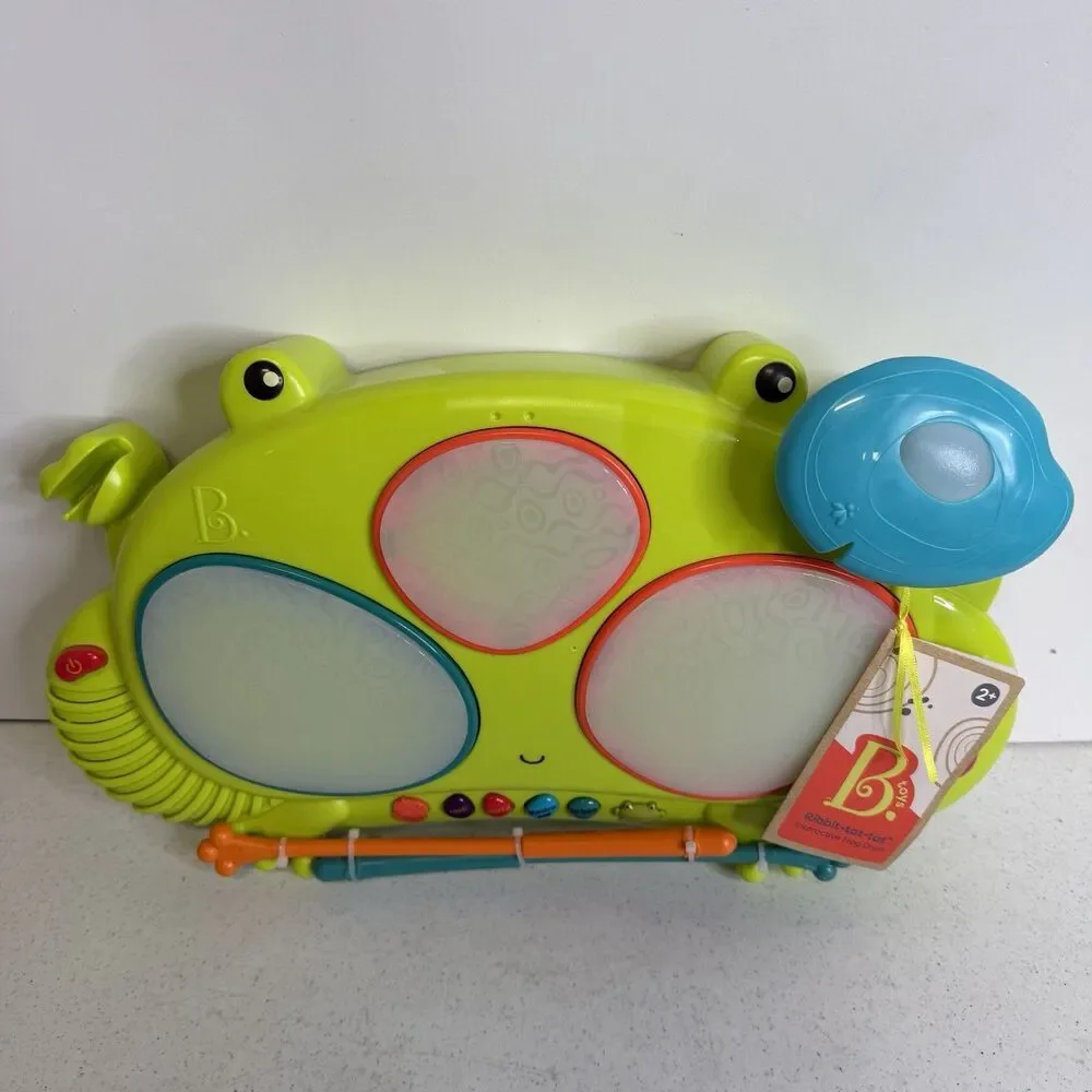 B. Toys Ribbit Tat Tat Interactive Music Lights Frog Drum